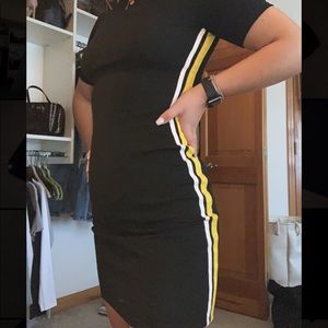 Black dress with white and yellow stripe on side